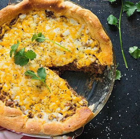 Taco pie with crescent rolls - Steps: Heat oven to 375°F. Unroll dough; separate into 8 triangles. Place in ungreased 9-inch square pan or 10-inch pie plate; press over bottom and up sides to form crust. In 10-inch skillet, cook beef over medium heat 8 to 10 minutes, stirring occasionally, until thoroughly cooked; drain. Stir in salsa and taco seasoning mix; simmer 5 minutes.